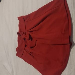 Rust color pleated shorts